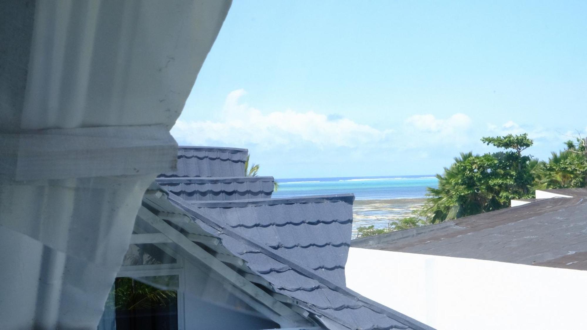 Kobe House Bed & Breakfast จัมเบียนี ห้อง รูปภาพ