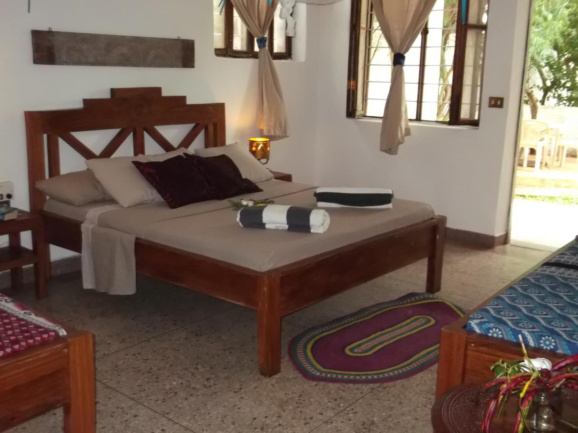 Kobe House Bed & Breakfast จัมเบียนี ห้อง รูปภาพ