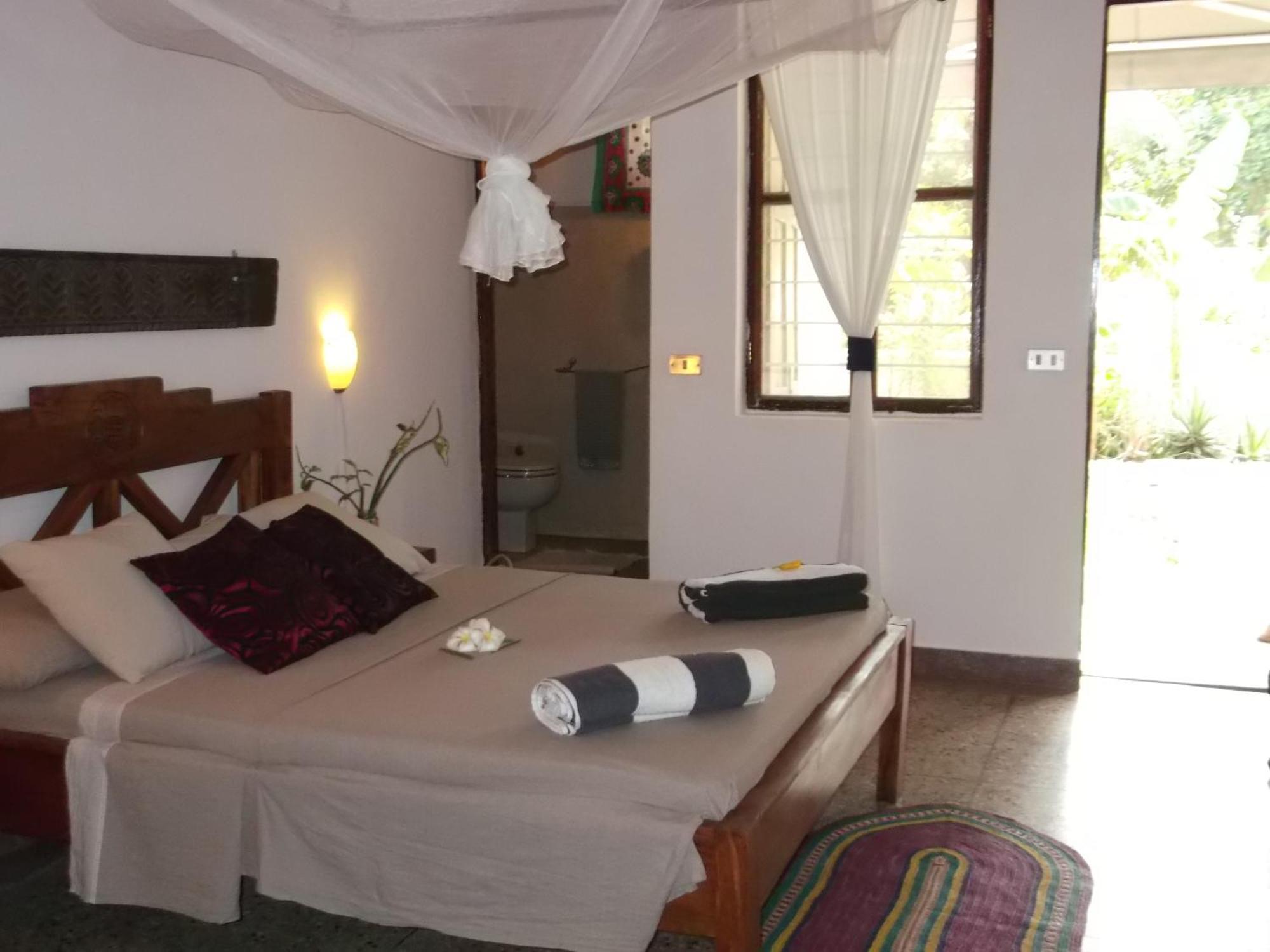 Kobe House Bed & Breakfast จัมเบียนี ห้อง รูปภาพ