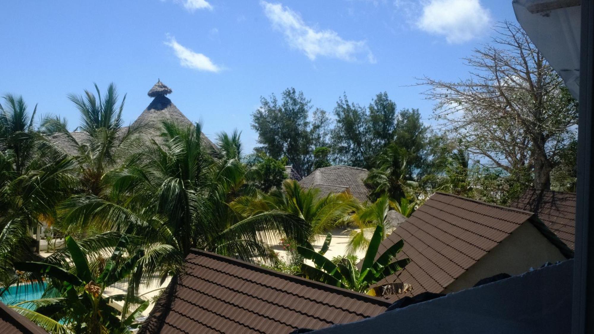 Kobe House Bed & Breakfast จัมเบียนี ห้อง รูปภาพ